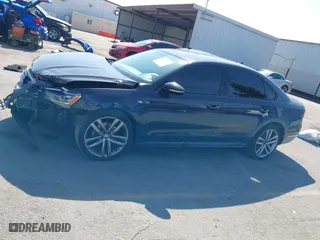 2018 Volkswagen Passat 2.0T S with VIN 1VWAA7A34JC025600, listed as a IAAI auction lot 41594079 with 92,019 mi miles. Bid and sale history available at carsss.com. Image 14.