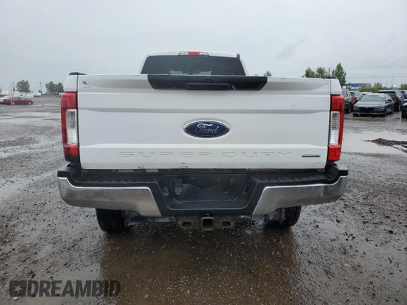 2017 Ford F-350 XL with VIN 1FT8X3B69HED22166, listed as a Copart auction lot 65051355 with 260,728 mi miles and Salvage title. Bid and sale history available at DreamBid. Image 6.