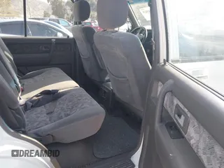 2001 Isuzu Trooper S z VIN JACDS58XX17J04528, wystawiony jako IAAI lot #41945828 z przebiegiem 113 152 mil mil oraz . Historia ofert i sprzedaży dostępna na DreamBid. Obrazek 8.