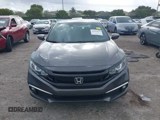 2019 Honda Civic Sport with VIN 2HGFC2F89KH563333, listed as a IAAI auction lot 41959217 with 66,068 mi miles and . Bid and sale history available at DreamBid. Image 12.