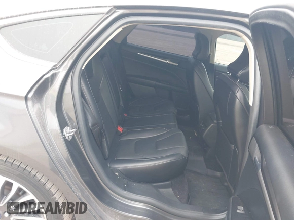2017 Ford Fusion Titanium with VIN 3FA6P0SU8HR104727, listed as a IAAI auction lot 41242482 with 83,021 mi miles and . Bid and sale history available at DreamBid. Image 8.