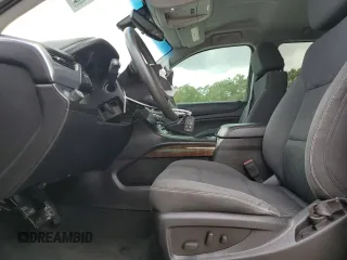 2015 Chevrolet Tahoe LS with VIN 1GNSCAKC4FR116004, listed as a Copart auction lot 54599375 with 87,645 mi miles and Salvage title. Bid and sale history available at DreamBid. Image 7.