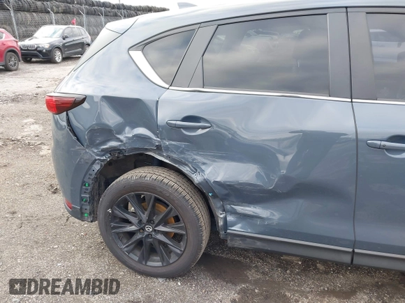 2021 Mazda CX-5 Touring with VIN JM3KFBCM5M0483547, listed as a IAAI auction lot 41683694 with 55,791 mi miles. Bid and sale history available at carsss.com. Image 6.
