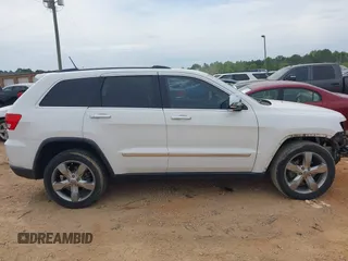 2013 Jeep Grand Cherokee Overland with VIN 1C4RJECGXDC621227, listed as a IAAI auction lot 42098042 with 194,232 mi miles and . Bid and sale history available at DreamBid. Image 13.