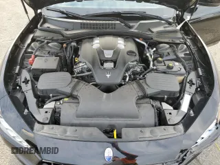 2021 Maserati Ghibli with VIN ZAM57XSA5M1369156, listed as a Copart auction lot 82876193 with 19,415 mi miles. Bid and sale history available at carsss.com. Image 12.