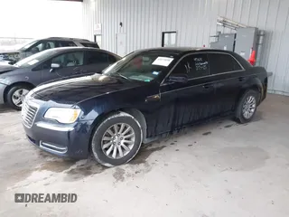 2011 Chrysler 300 with VIN 2C3CA4CGXBH523474, listed as a IAAI auction lot 41673690 with 187,389 mi miles. Bid and sale history available at carsss.com. Image 2.
