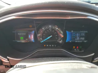2015 Ford Fusion SE Hybrid z VIN 3FA6P0LU7FR102723, wystawiony jako Copart lot #62334345 z przebiegiem 136 341 mil mil oraz Nie do naprawy • Non repairable. Historia ofert i sprzedaży dostępna na DreamBid. Obrazek 9.
