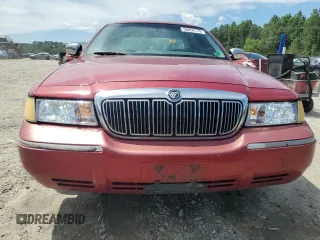 2000 Mercury Grand Marquis GS z VIN 2MEFM74W3YX679702, wystawiony jako Copart lot #58058175 z przebiegiem 161 245 mil mil oraz Szkoda całkowita • Salvage title. Historia ofert i sprzedaży dostępna na DreamBid. Obrazek 5.