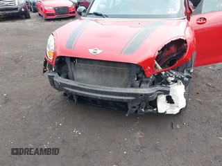 2013 MINI Cooper Countryman with VIN WMWZB3C57DWM07565, listed as a IAAI auction lot 41655938 with 62,694 mi miles. Bid and sale history available at carsss.com. Image 6.