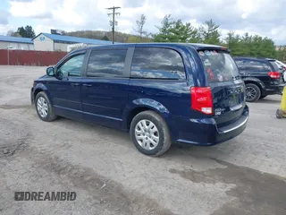 2016 Dodge Grand Caravan SE with VIN 2C4RDGBG4GR146450, listed as a IAAI auction lot 42015145 with 128,725 mi miles. Bid and sale history available at carsss.com. Image 3.