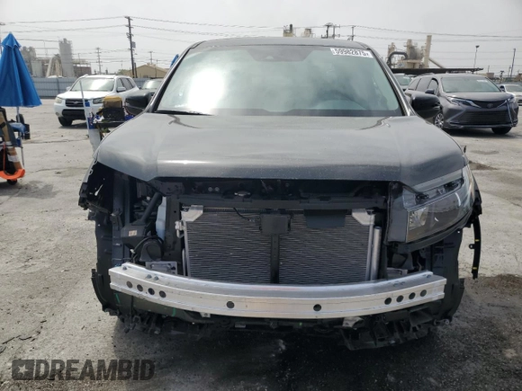 2025 Honda Ridgeline RTL with VIN 5FPYK3F52SB014785, listed as a Copart auction lot 59982875 with 2,341 mi miles and Salvage title. Bid and sale history available at DreamBid. Image 5.
