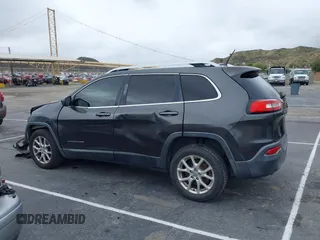 2014 Jeep Cherokee Latitude z VIN 1C4PJLCS2EW217130, wystawiony jako IAAI lot #41782039 z przebiegiem 129 080 mil mil oraz . Historia ofert i sprzedaży dostępna na DreamBid. Obrazek 14.