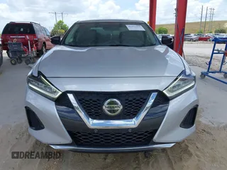 2020 Nissan Maxima SV z VIN 1N4AA6CV6LC366887, wystawiony jako IAAI lot #41952159 z przebiegiem 100 182 mil mil oraz . Historia ofert i sprzedaży dostępna na DreamBid. Obrazek 12.