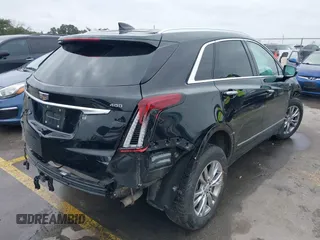 2021 Cadillac XT5 FWD Premium Luxury with VIN 1GYKNCRS3MZ103893, listed as a IAAI auction lot 41286761 with 75,728 mi miles and . Bid and sale history available at carsss.com. Image 4.