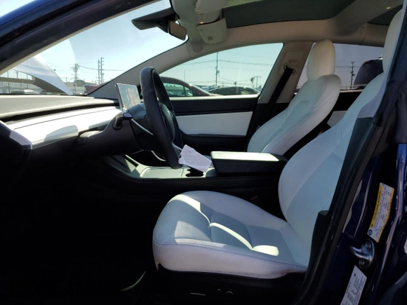 2021 Tesla Model 3 Long Range with VIN 5YJ3E1EBXMF925147, listed as a Copart auction lot 49741275 with 106,947 mi miles and Salvage Title. Bid and sale history available at DreamBid. Image 7.