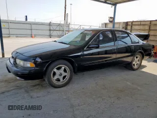 1996 Chevrolet Caprice 1SA Special Value z VIN 1G1BL52P6TR157242, wystawiony jako Copart lot #57406385 z przebiegiem 216 332 mil mil oraz Szkoda całkowita • Salvage title. Historia ofert i sprzedaży dostępna na DreamBid. Obrazek 1.
