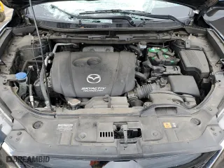 2015 Mazda CX-5 Touring with VIN JM3KE4CY3F0475757, listed as a Copart auction lot 53477875 with 104,546 mi miles and Salvage Title. Bid and sale history available at carsss.com. Image 11.