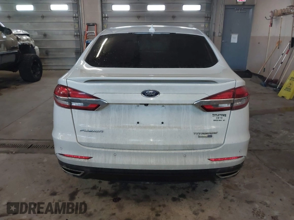 2019 Ford Fusion Titanium with VIN 3FA6P0D92KR153096, listed as a IAAI auction lot 41679393 with 127,292 mi miles and . Bid and sale history available at DreamBid. Image 17.