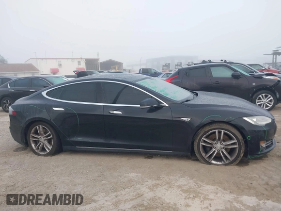 2015 Tesla Model S 85D with VIN 5YJSA1E24FF111120, listed as a IAAI auction lot 41471698 with 58,126 mi miles. Bid and sale history available at carsss.com. Image 14.