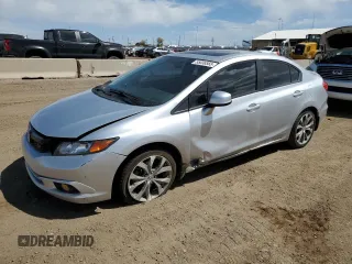 2012 Honda Civic Si z VIN 2HGFB6E5XCH706275, wystawiony jako Copart lot #55036565 z przebiegiem 105 391 mil mil oraz Szkoda całkowita • Salvage title. Historia ofert i sprzedaży dostępna na DreamBid. Obrazek 1.