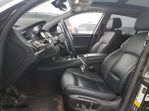 2016 BMW 5 Series Gran Turismo 550i xDrive with VIN WBA5M0C57GD085162, listed as a Copart auction lot 55271984 with 106,087 mi miles and Salvage Title. Bid and sale history available at carsss.com. Image 7.