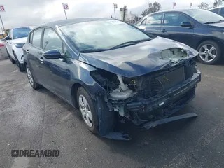 2017 Kia Forte5 LX with VIN KNAFK5A83H5709281, listed as a IAAI auction lot 41482492 with 74,979 mi miles. Bid and sale history available at carsss.com. Image 1.