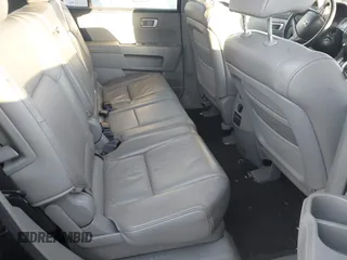 2009 Honda Pilot EX-L with VIN 5FNYF48659B012032, listed as a IAAI auction lot 41801232 with 205,636 mi miles and . Bid and sale history available at carsss.com. Image 8.