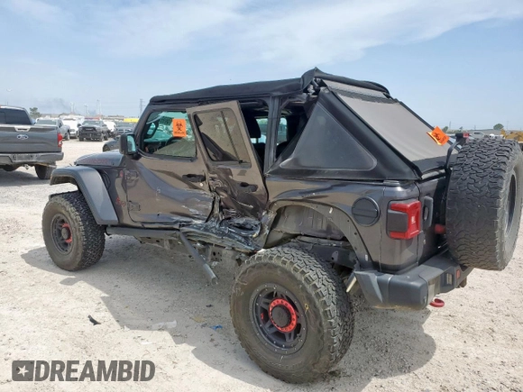 2018 Jeep Wrangler Unlimited Rubicon with VIN 1C4HJXFG6JW166731, listed as a Copart auction lot 56997385 with 117,713 mi miles and Salvage title. Bid and sale history available at DreamBid. Image 2.