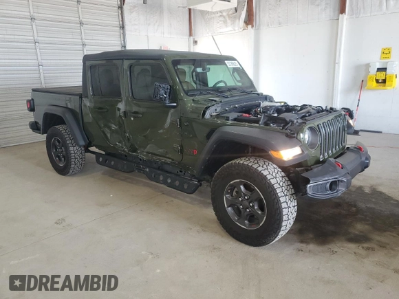 2023 Jeep Gladiator Rubicon with VIN 1C6JJTBGXPL537729, listed as a Copart auction lot 53788625 with 17,568 mi miles and Salvage title. Bid and sale history available at DreamBid. Image 4.