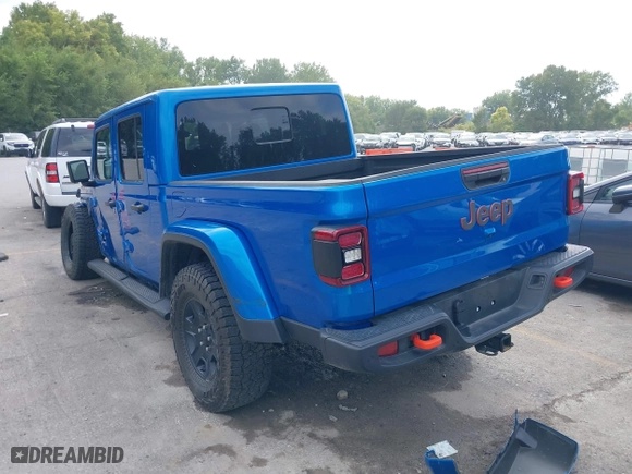 2023 Jeep Gladiator Mojave with VIN 1C6JJTEG0PL593061, listed as a IAAI auction lot 40287955 with 3,930 mi miles. Bid and sale history available at carsss.com. Image 3.