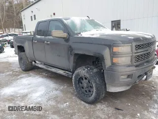 2015 Chevrolet Silverado 1500 LT with VIN 1GCVKREHXFZ350047, listed as a IAAI auction lot 41315609 with 134,560 mi miles. Bid and sale history available at carsss.com. Image 1.