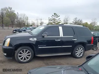2009 Cadillac Escalade with VIN 1GYFK23219R102455, listed as a IAAI auction lot 42094042 with 238,407 mi miles. Bid and sale history available at carsss.com. Image 15.