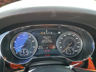 2019 Bentley Bentayga V8 z VIN SJAAM2ZV7KC025449, wystawiony jako Copart lot #62903583 z przebiegiem 12 615 mil mil oraz . Historia ofert i sprzedaży dostępna na DreamBid. Obrazek 9.