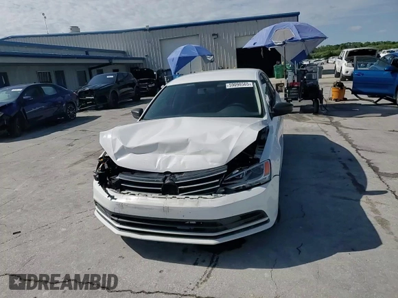 2015 Volkswagen Jetta S with VIN 3VW2K7AJ9FM323047, listed as a Copart auction lot 59098565 with 169,648 mi miles and Salvage title. Bid and sale history available at DreamBid. Image 13.