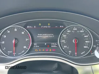 2016 Audi A7 3.0 Prestige with VIN WAU2GAFCXGN102993, listed as a IAAI auction lot 42099259 with 64,490 mi miles. Bid and sale history available at carsss.com. Image 7.