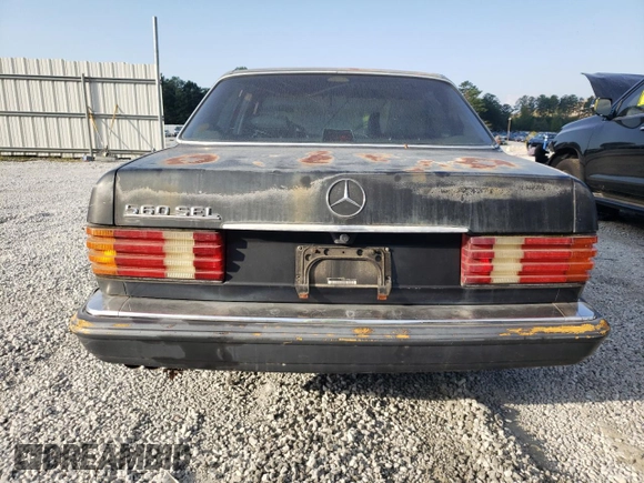 1990 Mercedes-Benz 560 with VIN WDBCA39E8LA508059, listed as a Copart auction lot 75865254 with 222,616 mi miles and Clean Title. Bid and sale history available at DreamBid. Image 6.