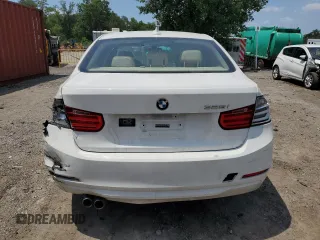 2013 BMW 3 Series 328i with VIN WBA3A5G58DNP21035, listed as a Copart auction lot 60543305 with 151,768 mi miles and Salvage title. Bid and sale history available at DreamBid. Image 6.