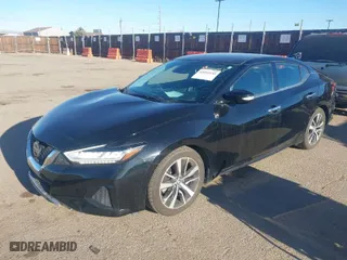 2021 Nissan Maxima SV with VIN 1N4AA6CV0MC512167, listed as a IAAI auction lot 41692145 with 63,680 mi miles. Bid and sale history available at carsss.com. Image 2.
