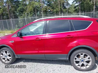 2015 Ford Escape Titanium with VIN 1FMCU9J93FUB28037, listed as a IAAI auction lot 42432345 with 133,242 mi miles and . Bid and sale history available at DreamBid. Image 14.