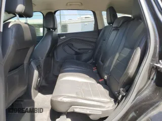 2015 Ford Escape Titanium with VIN 1FMCU0J97FUC80446, listed as a Copart auction lot 58749895 with 106,890 mi miles and Salvage title. Bid and sale history available at DreamBid. Image 11.