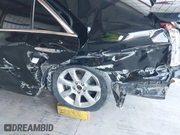 2014 Cadillac ATS Standard RWD with VIN 1G6AA5RX3E0159300, listed as a IAAI auction lot 40271449 with 124,125 mi miles. Bid and sale history available at carsss.com. Image 13.