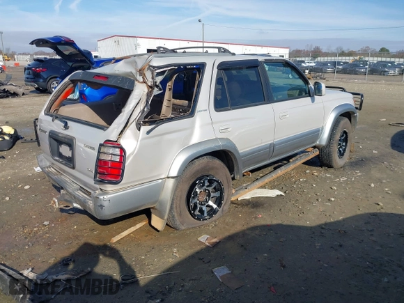 2000 Toyota 4Runner Limited with VIN JT3GN87R4Y0158912, listed as a IAAI auction lot 41130940 with 267,713 mi miles and . Bid and sale history available at DreamBid. Image 4.