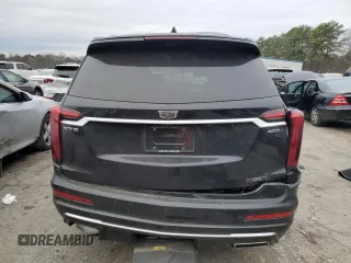 2022 Cadillac XT6 Premium Luxury with VIN 1GYKPCRS7NZ143003, listed as a Copart auction lot 86708864 with 0 mi miles and Salvage Title. Bid and sale history available at carsss.com. Image 6.