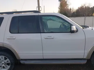 2010 Ford Explorer Eddie Bauer with VIN 1FMEU7EE0AUA56016, listed as a IAAI auction lot 41172194 with 144,672 mi miles. Bid and sale history available at carsss.com. Image 14.