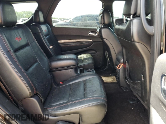 2016 Dodge Durango R/T with VIN 1C4SDHCT9GC415957, listed as a Copart auction lot 53565115 with 144,412 mi miles and Salvage title. Bid and sale history available at DreamBid. Image 11.
