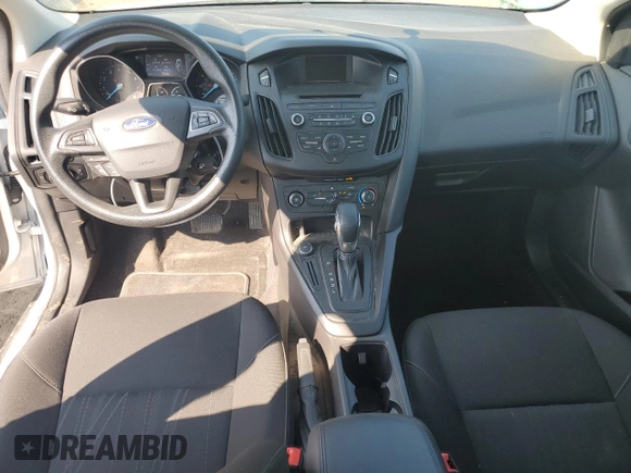 2017 Ford Focus SE with VIN 1FADP3F26HL313478, listed as a Copart auction lot 57078015 with 56,807 mi miles and Salvage title. Bid and sale history available at DreamBid. Image 8.