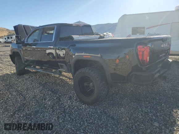 2021 GMC Sierra 3500HD Denali z VIN 1GT49WEY3MF296109, wystawiony jako Copart lot #67886764 z przebiegiem Nie podano mil oraz Szkoda całkowita • Salvage title. Historia ofert i sprzedaży dostępna na DreamBid. Obrazek 2.