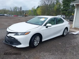 2019 Toyota Camry LE z VIN 4T1B11HK8KU819721, wystawiony jako IAAI lot #42127411 z przebiegiem 101 333 mil mil oraz . Historia ofert i sprzedaży dostępna na DreamBid. Obrazek 19.