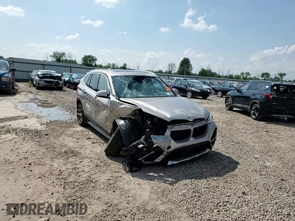 2021 BMW X1 xDrive28i with VIN WBXJG9C09M5S52289, listed as a Copart auction lot 64413105 with Not provided miles and Salvage title. Bid and sale history available at DreamBid. Image 14.