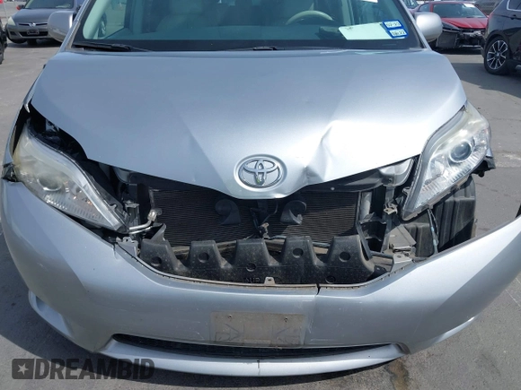 2014 Toyota Sienna Limited with VIN 5TDDK3DC2ES085302, listed as a IAAI auction lot 39560374 with 117,786 mi miles and . Bid and sale history available at DreamBid. Image 6.
